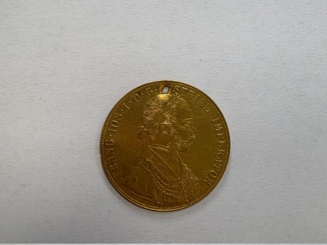 (o)moneda din aur 980%,  anul de emisie 1915,cu portretul lui Franc Iosif  13,89 grame,  grop 38