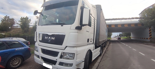 marca MAN model TGX 18.4404x2BLS culoare Alb