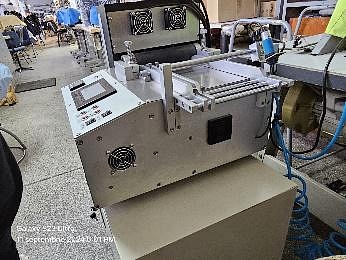 Masina debitat benzi textile
