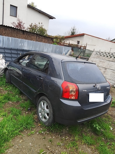 Autoturism marca Toyota model Corolla culoare Gri