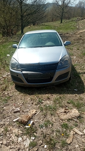 Autoturism marca Opel model Astra culoare Gri